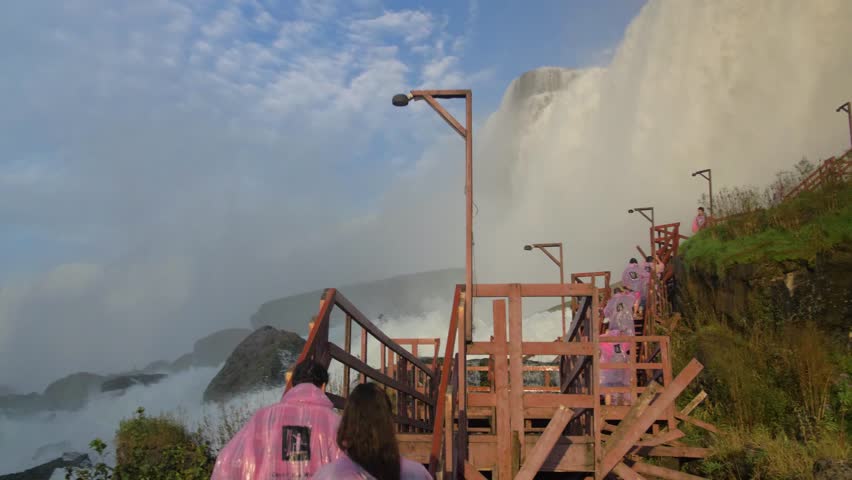 Couple Climb Stairs Path at Niagara Falls, Waterfall Rainbow