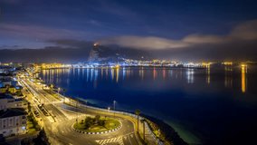 Beautiful 1080 HD time-lapse video of the sun rising next to the Rock of Gibraltar taken from La Línea de la Concepción