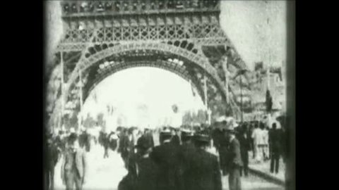 CIRCA 1900 - 1900 - The Eiffel Tower with the great Paris Exposition in the background, looking down Champs de Mars.