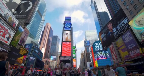 New York, New York / United States - September 18 2018: Time Square NYC, Beautiful Sunny Day with Tourists