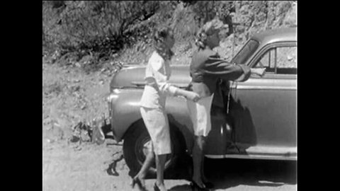 CIRCA 1930s - A 1930's stag film depicts two strippers hitchhiking for sex.