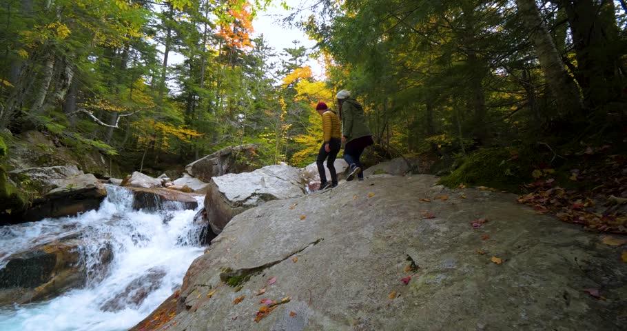Couple Hikes Along Rocks In Forest, Waterfall, Franconia Notch