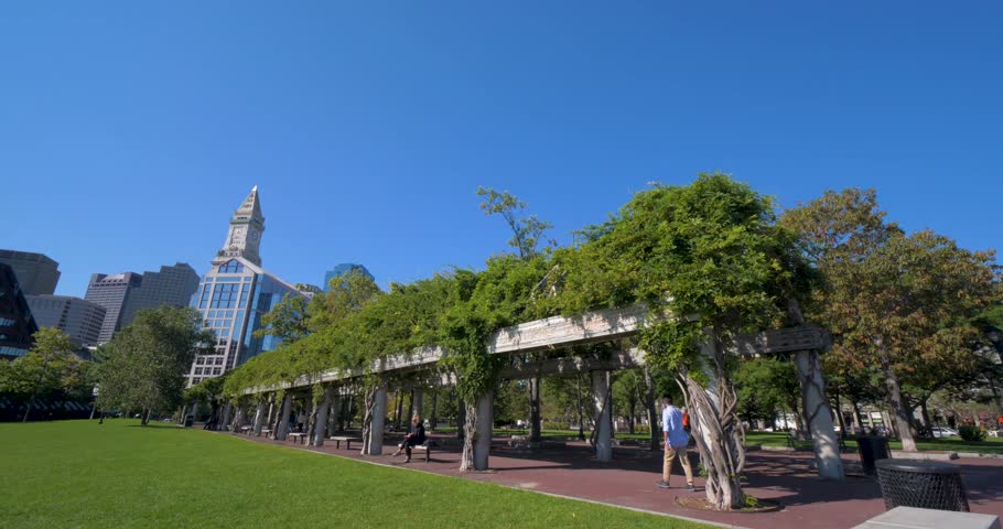 Tourists Walk Through Arch in Columbus Park, Downtown Bostom