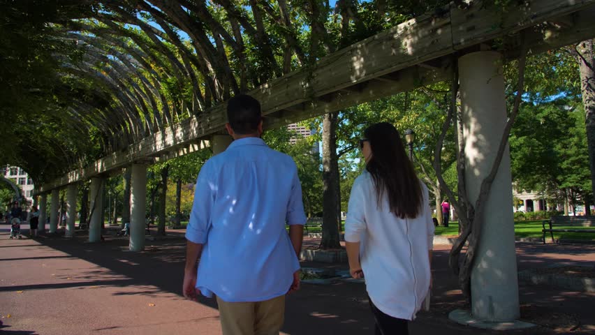 Couple Walking Through Arch in Columbus Park, Downtown Bostom