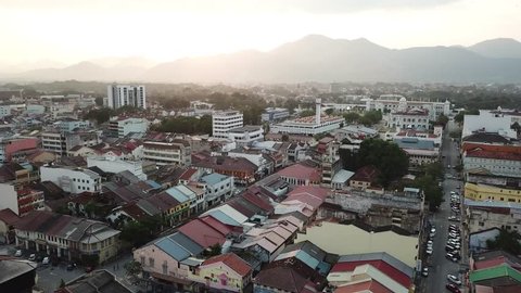 IPOH, MALAYSIA - FEBRUARY 5, 2019 : Aerial overhead view over house  Colorful roofs at heritage trail walk in old town of Ipoh, Perak