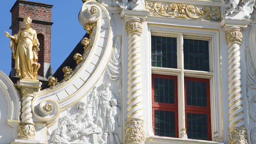 Decorated facade of the Civiele Griffie / old civil registrar at the Burg, Bruges, Flanders, Belgium, Tilt up