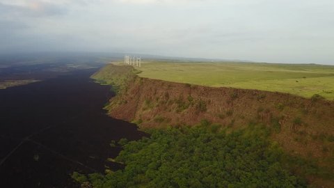 drone panning to the right over cliffs of hawaii south point big island