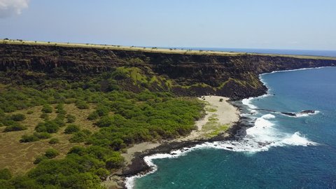 drone flying along cliffs of big island hawaii