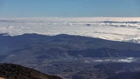 Time lapse of Teide Observatory above the huge sea of clouds, Tenerife, Spain