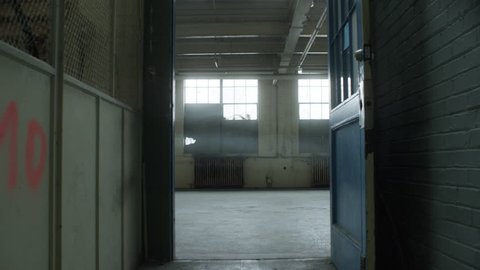 Slowly drifting into industrial loft warehouse. Filmed with RED Dragon 6K camera