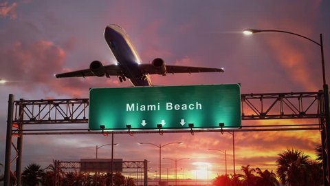 Airplane Take off Miami Beach during a wonderful sunset