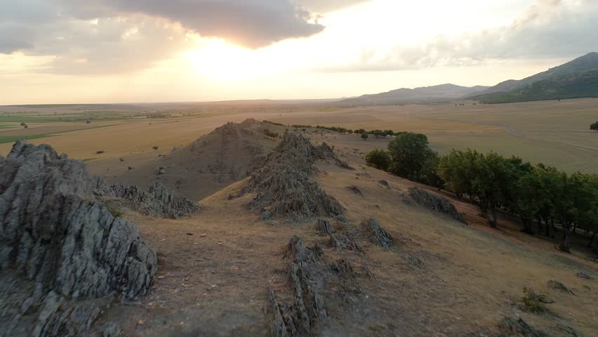 beautiful sunset over fields in Dobrogea, Romania