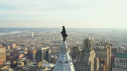 Aerial flyover William Penn Statue on top of the Philadelphia City Hall tower