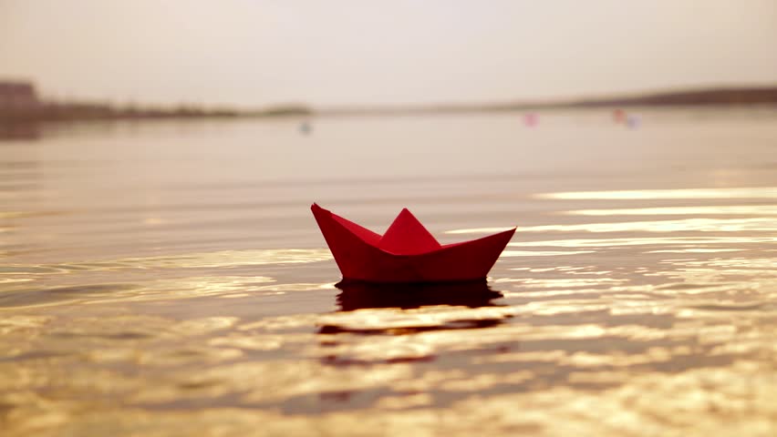 6 in 1 video! The toy paper boat on the surface… - Royalty Free Video