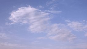 Beautiful summer sunny clean sky, white big formating fluffy clouds, time lapse soft, nice angry cloudscape in horizon, relaxing weather. -UHD.