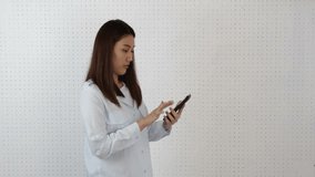 Asian woman shopping online
