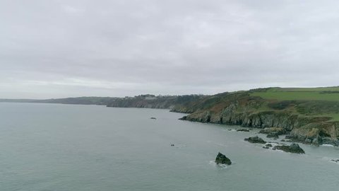 Aerial tracking along the vast cliff coastline of South Devon. Just south of Dartmouth. Looking towards Slapton Sands.