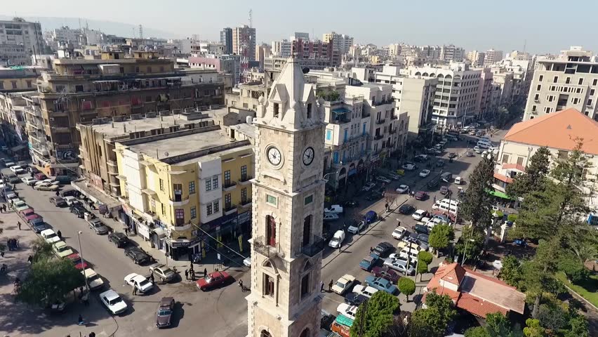 Aerial Shot for El-Tall Clock Tower, Tripoli-Lebanon  showing traditional and historical  Streets built in 1906s Royalty-Free Stock Footage #1023884374