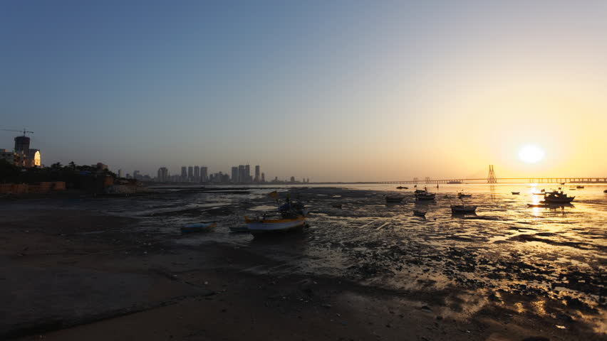 Bandra Worli sea link also known as Rajiv Gandhi Sea link with Mumbai skyline, at Sunset, Mumbai, India.