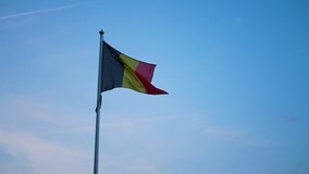 Belgium flag waving on blue sky