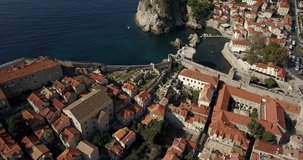 Aerial shot of Dubrovnik Old town, the camera rises slowly to reveal the ancient fort.