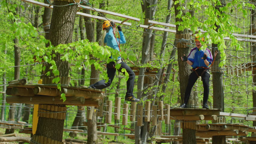 Couple having fun in an adventure park.