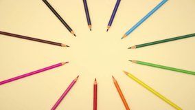 Colorful pencils come and go, stop motion animation video.
