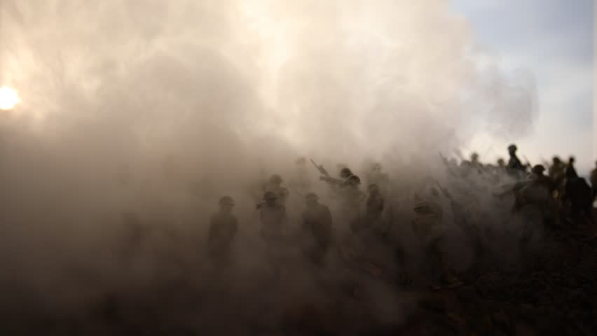 War Concept. Military silhouettes fighting scene on war fog sky background, World War Soldiers Silhouettes Below Cloudy Skyline at sunset. Attack scene. Armored vehicles. tank in action