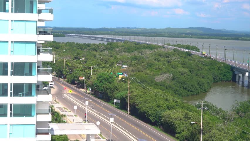 Cars along the road in La Boquilla, Cartagena, Colombia