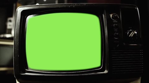 Retro TV with Chroma Key Green Screen. Close Up. Zoom In. You can replace green screen with the footage or picture you want with “Keying” effect (check out tutorials on YouTube).