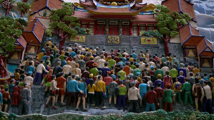 4K, A Taiwanese temple decorated with carved on the stone walls of people visit the Nankunshen Daitian Temple for performing religious rituals. Decorative chinese art style of religious beliefs-Dan