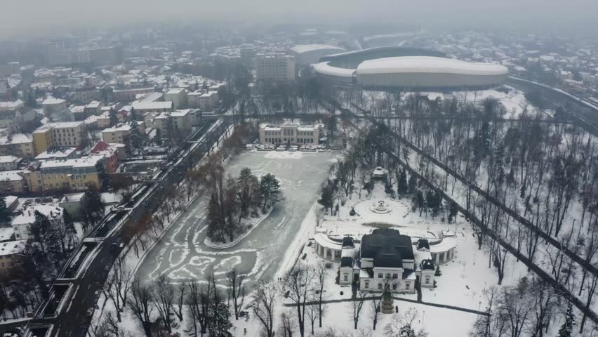 Aerial Day Shot After Heavy Snowfall In The City. Winter Park, Cluj, Romania
