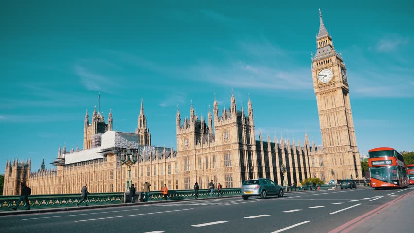 LONDON, UK - May 19, 2017: Traffic on Westminster Bridge with Houses of Parliment and Big Ben in the background