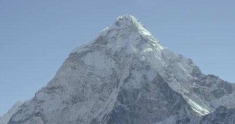K2 Mountain peak epic wide shot POV view of snowcapped summit of rock mountains in Nepal Tibet China near mount everest base camp