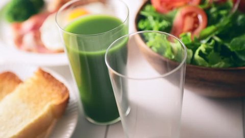 Green juice and breakfast image