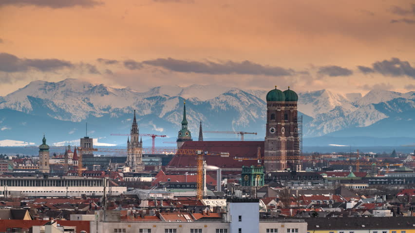 Munich skyline timelapse in background alps mountains view form top, Munich cathedral and marienplatz square view, Germany. Royalty-Free Stock Footage #1024007570