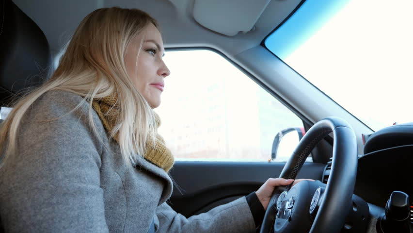 Young Blonde Girl Driving Car Stock Footage Video 100 Royaltyfree