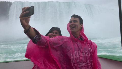 Happy Couple Takes Selfie on Boat at Niagara Falls, Tour Excursion