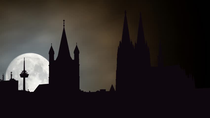Cologne: Skyline of historical center of City with Cathedral, Great St. Martin Church and Colonius TV Tower in silhouette by Night with Full Moon, Germany, Europe