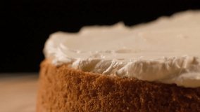 Putting Cake Layer on cream Close up Macro shot video
