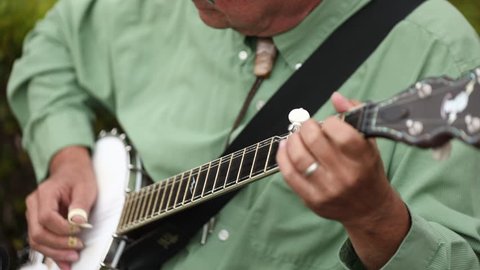 Banjo Player in a Green Shirt Playing at a Wedding