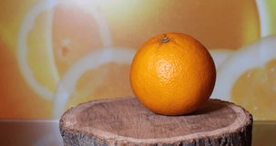 Closeup of sliced orange on wood