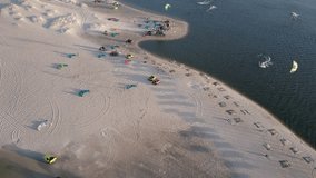 Cinematic drone shot of Kite Boarders on the beach in Combuco, Brazil