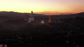 Aerial scene of fly over guanyin and temple in sunset scene 4k video