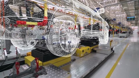 BELARUS, BORISOV - OCTOBER 19, 2017: Automobile plant, view of hologram projections of cars and power units, motion graphics in modern production of cars, car model visualization, assembly line.