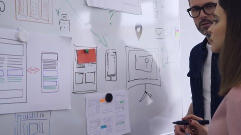 Web developers prototyping website layout 
