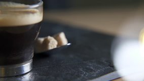 Close up of black coffee in stylish glass