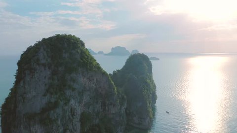 Top view of popular limestone mountains of Krabi Province, Thailand, Andaman sea.Stunning aerial landscape with karst formations, jungle in Ao Nang beach. Tourism, destination and vacation concept.