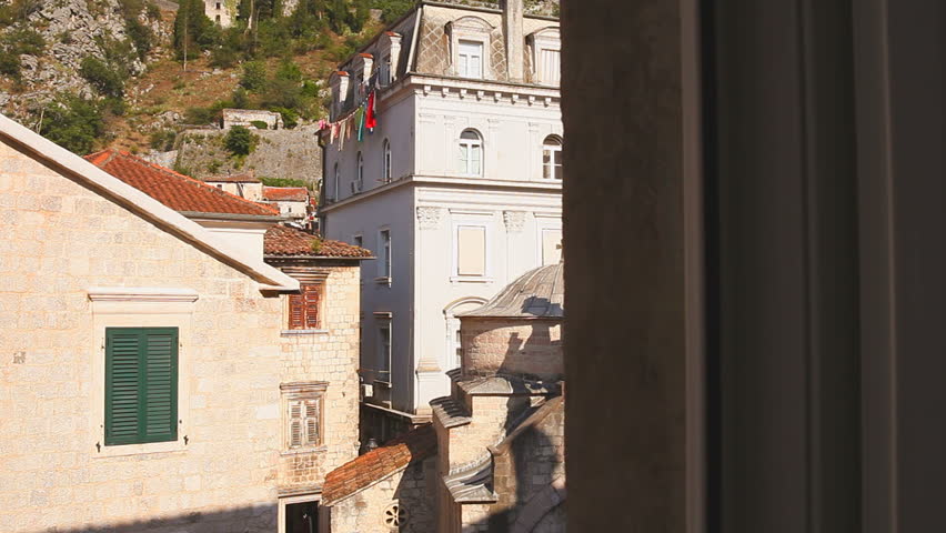 Stone buildings and roofs in the old town slider shoot