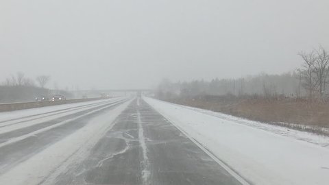Hamilton, Ontario, Canada February 2019 POV highway driving in snow storm during cold polar vortex winter